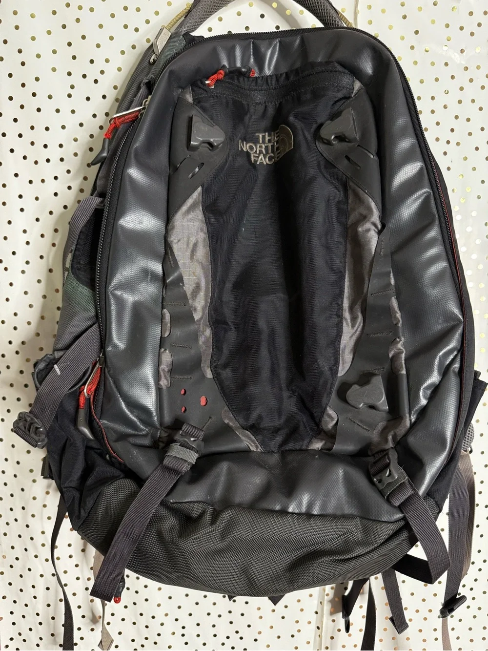 The North Face Black and Gray Men's Backpack with Red Accents